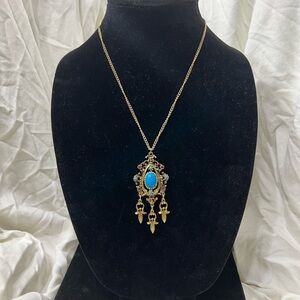 VINTAGE BROOCH 50 PLUS YEARS OLDE ON A 18” INCH GOLD FILLED CHAIN.